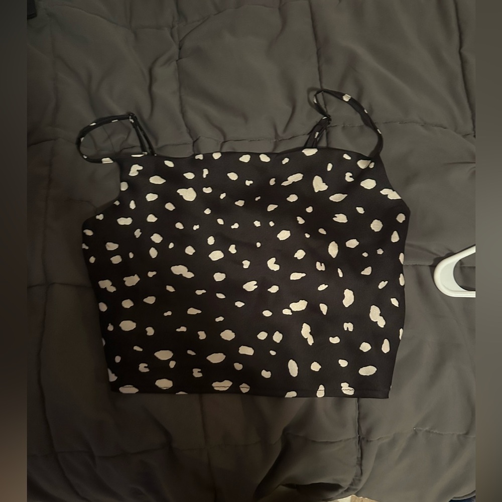 Black and white polka dotted tank top